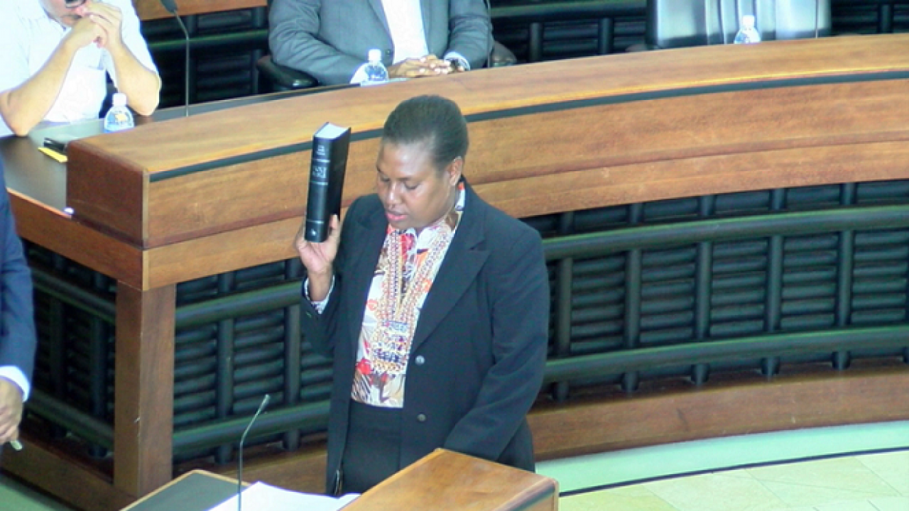 Newly elected MP for East Makira, Hon. Lily Maefai taking her oath on the floor of Parliament.